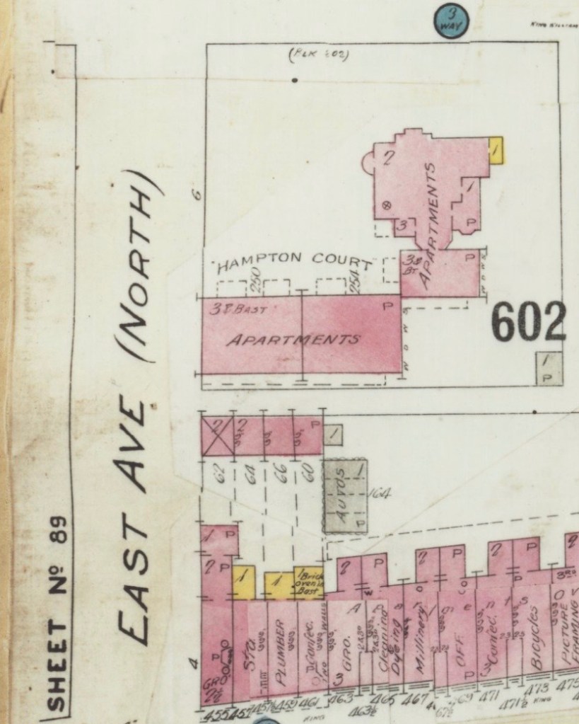 Fire insurance plan showing the east side of East Avenue North, between King William and King St. E. in about 1914. Hampton Court Apartments is written across 3 buildings in the upper half near King William, with a row of commercial storefronts, some with brick outbuildings, on King Street